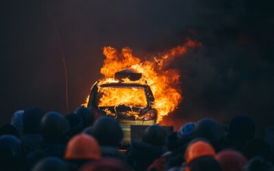 Burning car during anti-government riot