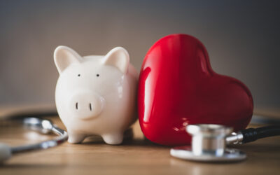 Piggy bank with red heart