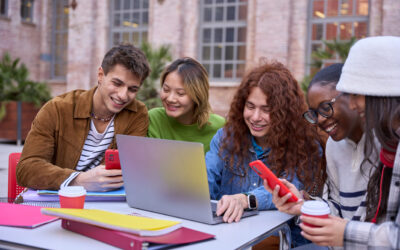 Group of happy multiracial students meeting to study together arriving at university campus