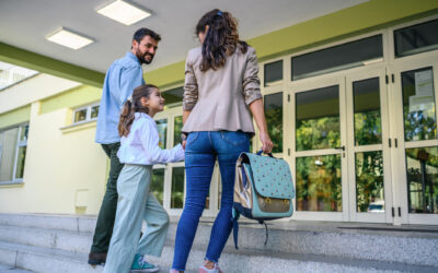 Featured Schools Open Day Mother and father taking their daughter to school