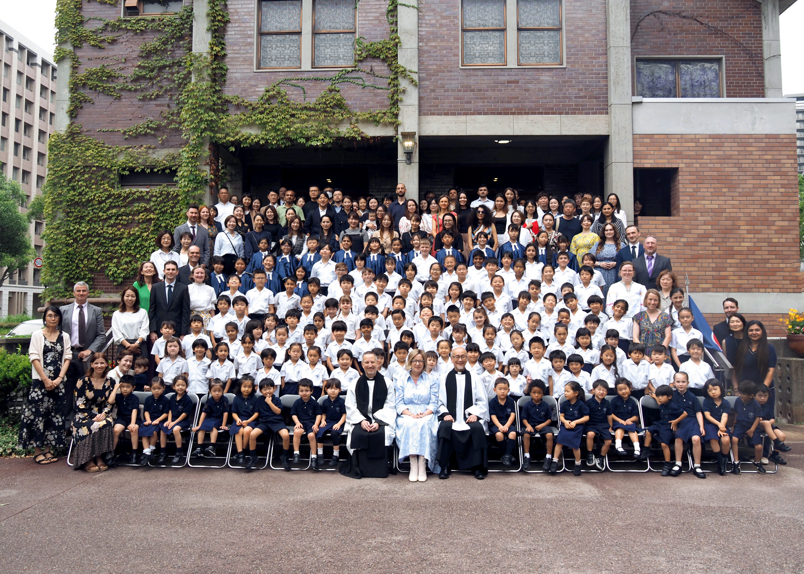 child with a soccer ball on pitch ISKL