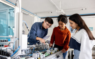 Steph McGovern launches new Teesside University scholarship to support women in engineering Robotic students discussing ideas about the operation of a production line robot