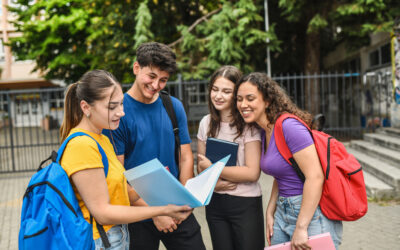 GCSE and IGCSE 2026 – results in review Classmates Comparing Exam Scores And Discussing Homework After Class Outdoors